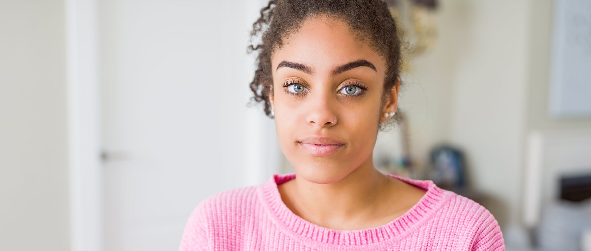 Woman thinking about an ultrasound to confirm her pregnancy
